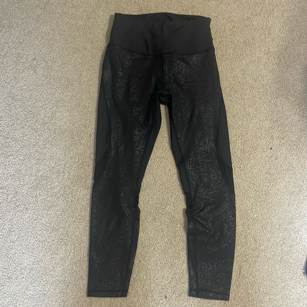 Marika leggings black printed front with mesh on backs of knee sz Medium